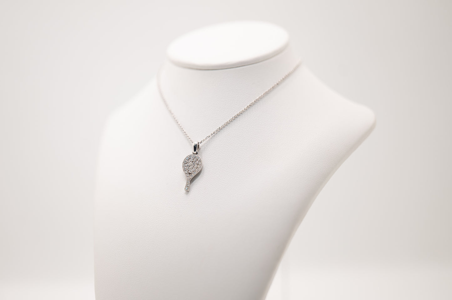 CIONDOLO RACCHETTA ORO BIANCO 18 KT E DIAMANTI LATO