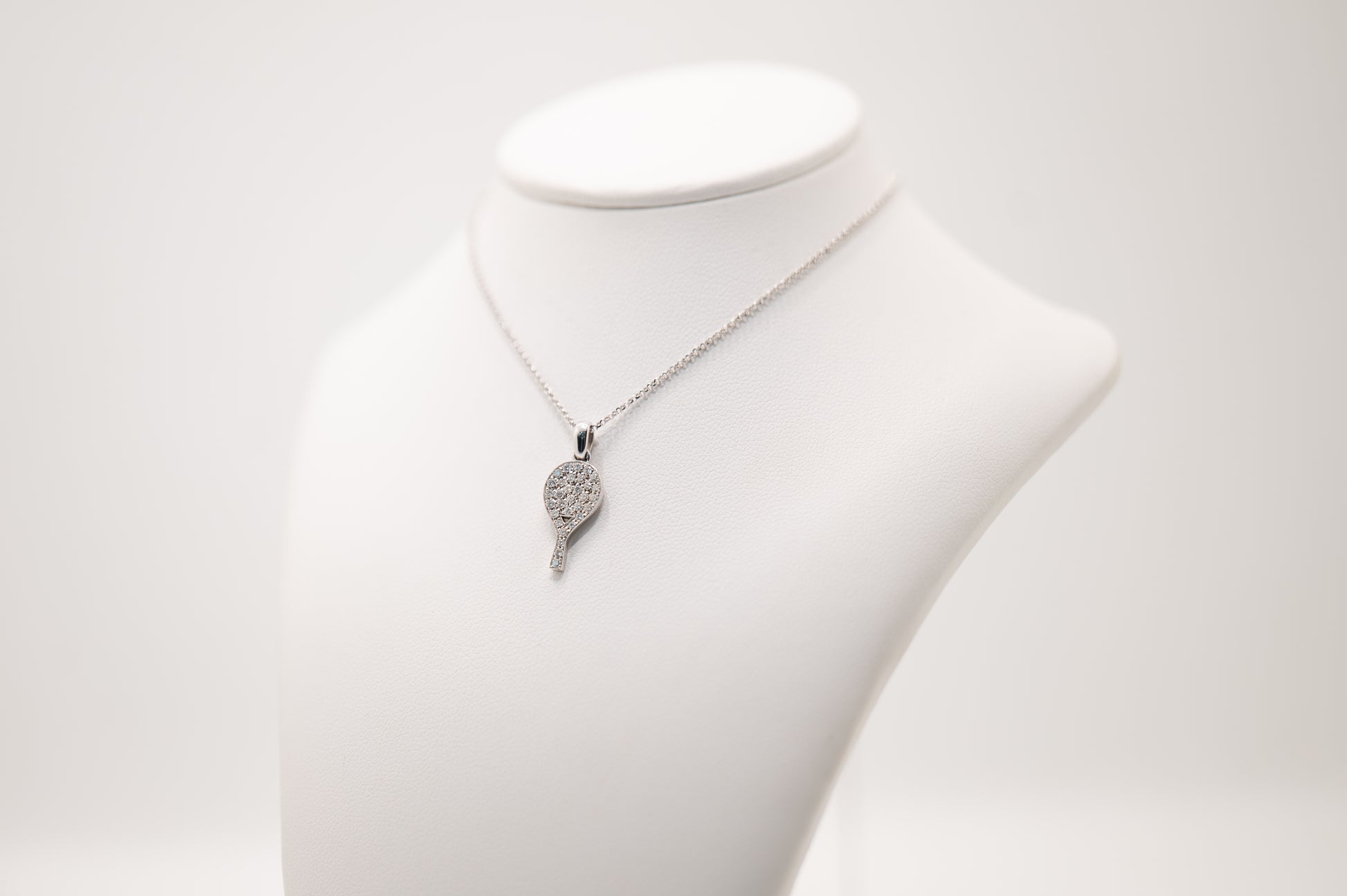 CIONDOLO RACCHETTA ORO BIANCO 18 KT E DIAMANTI LATO