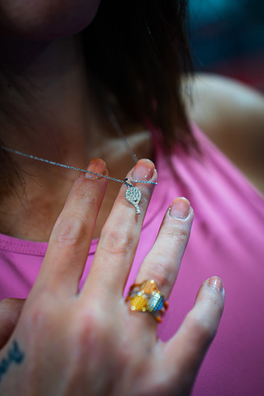 CIONDOLO RACCHETTA ORO BIANCO 18 KT E DIAMANTI BIANCHI TAGLIO BRILLANTE FOTO